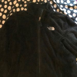 Black, fuzzy North face winter jacket